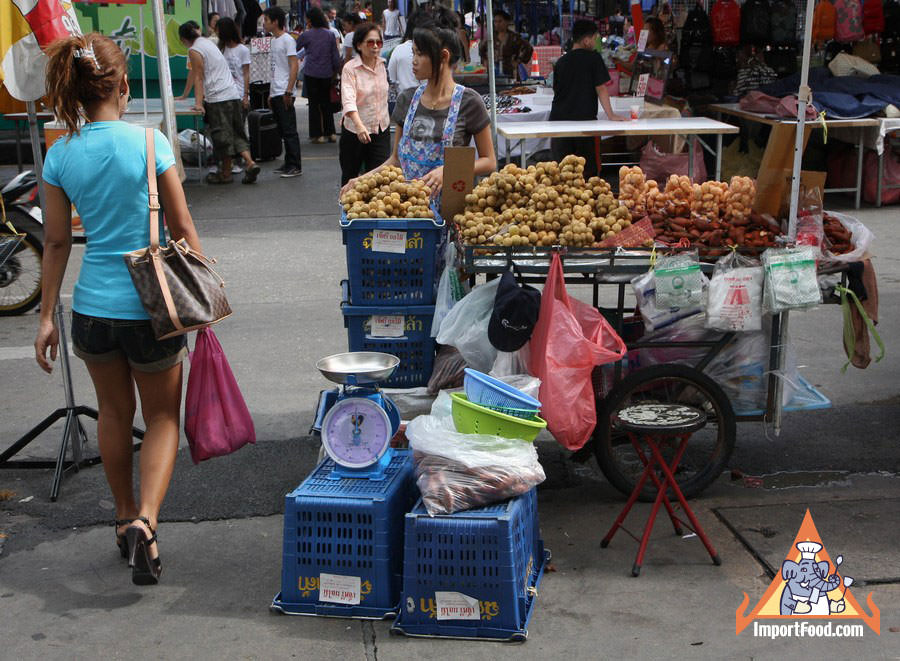 Young Lady Sells Fresh Longan