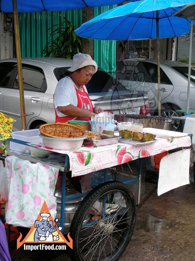 Thai Street Vendor Offers Haw Mukh from a Push Cart