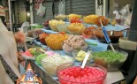 Bangkok Sidewalk Vendor Nong Amp Offers Assorted Thai Sweets and Appetizers