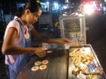 street-vendor-prepares-khanom-buang-06.jpg