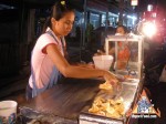 street-vendor-prepares-khanom-buang-08.jpg