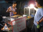 street-vendor-prepares-khanom-buang-09.jpg